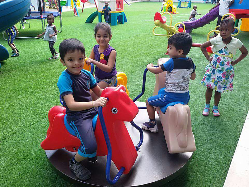 Kids on a merry go round